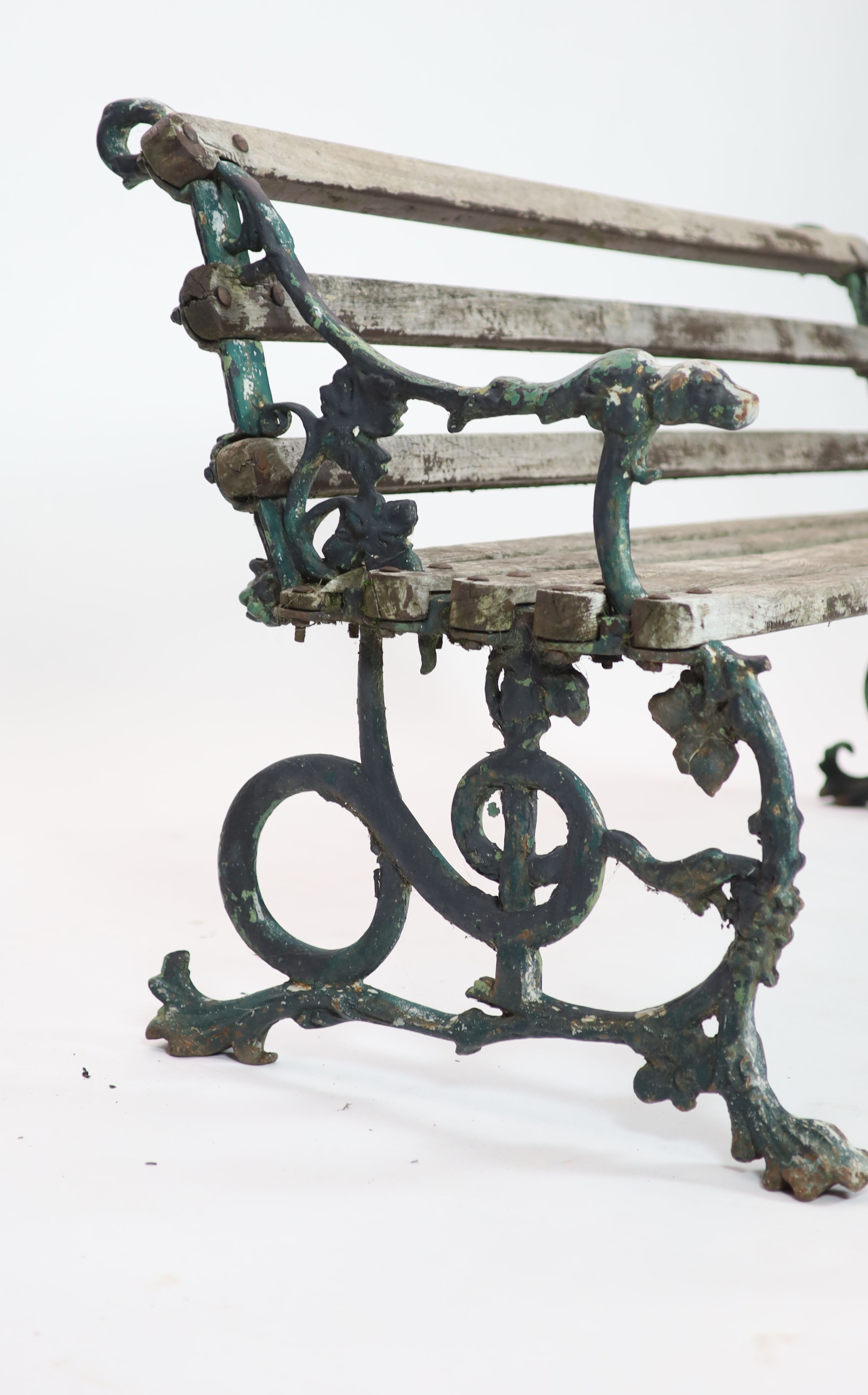 A Victorian Coalbrookdale cast iron 'Grape and serpent' garden bench H 76cm. W 160cm. D 70cm.